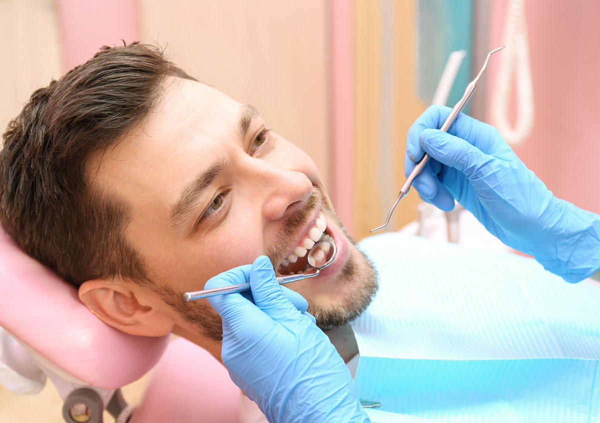 A man is having dental check-up