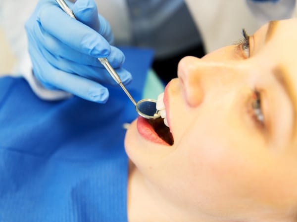 A woman having oral cancer screening at Goochland Dentistry